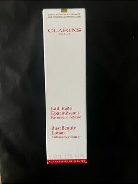 Clarins Bust Beauty Lotion — White with Red Text